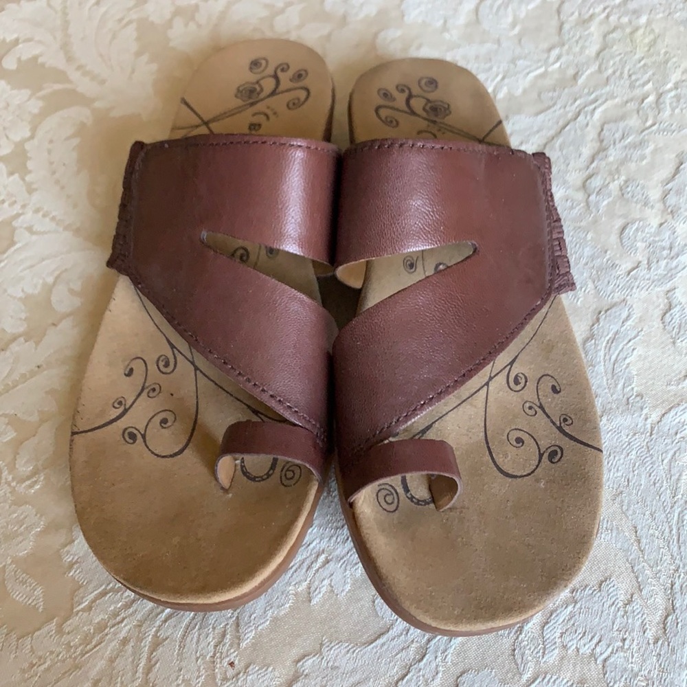 Brown leather upper sandals.